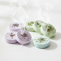 Colorful aromatherapy shower steamers set on white background