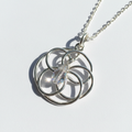 Sterling silver crystal pendant necklace on white background