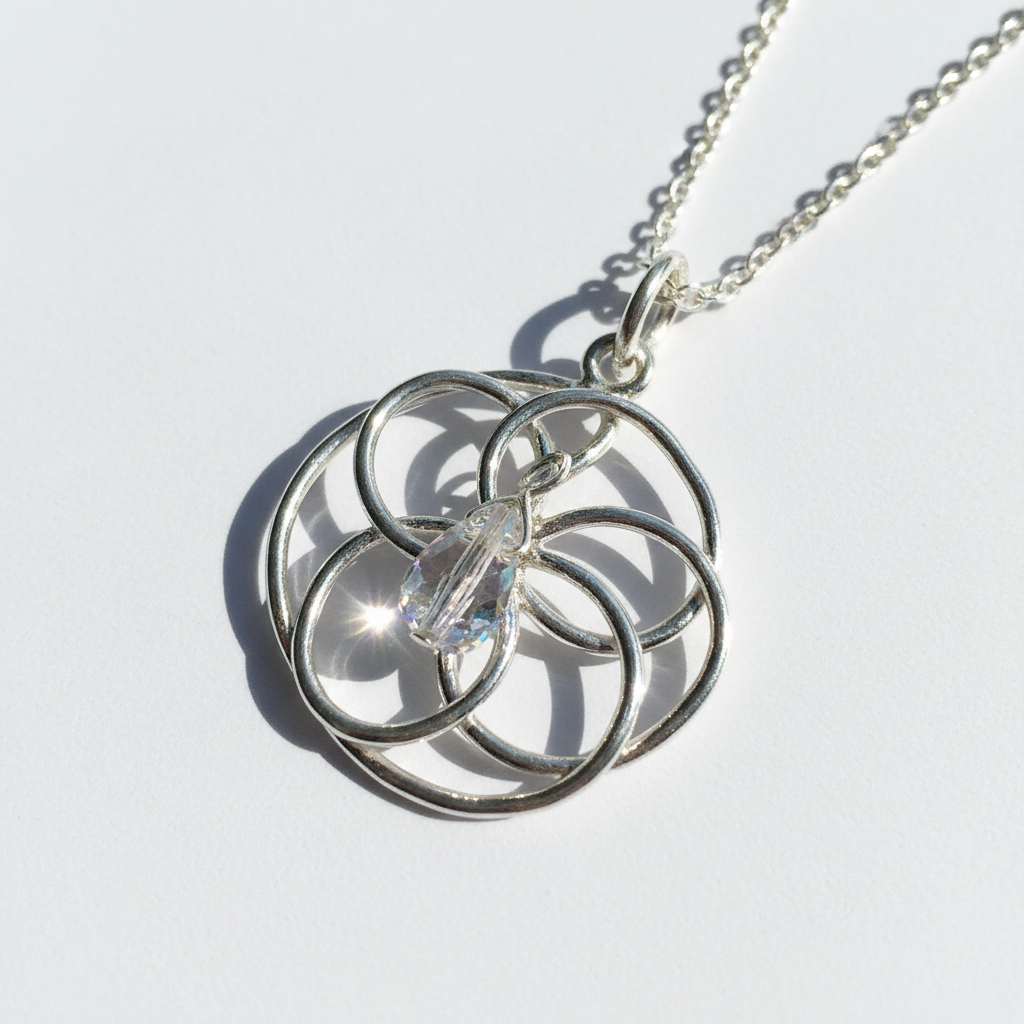 Sterling silver crystal pendant necklace on white background